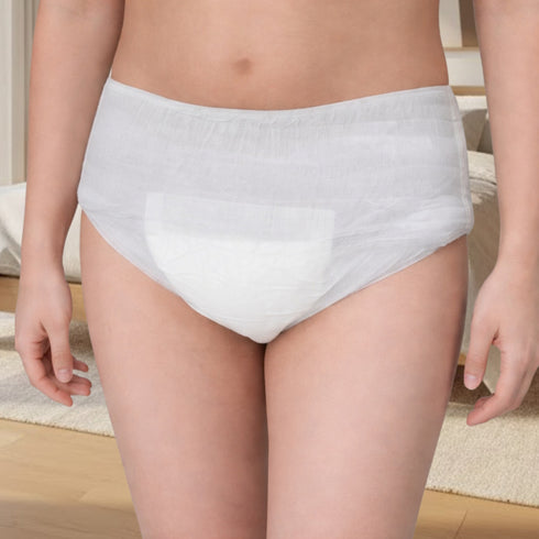 Fazlanix Pull-Up Einweg Inkontinenzhosen für Erwachsene Medium 86-117cm – Person trägt bequeme, diskrete und saugfähige Inkontinenzhose